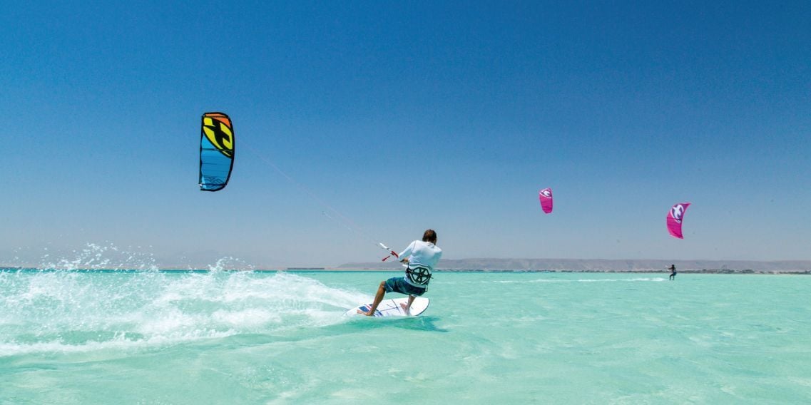 A kitesurfer in the air at the line-up — the kind of session 4Shor scores for you.